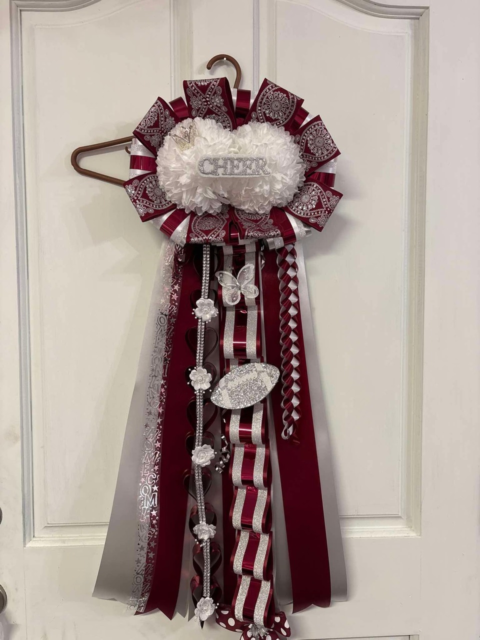 Burgundy and silver cheer-themed ribbon arrangement